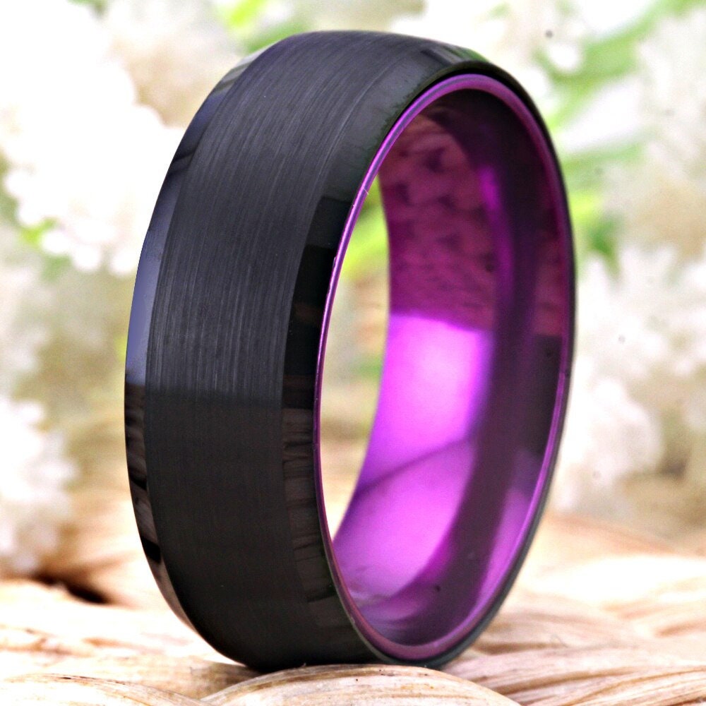 Purple mens ring with an 8mm black Tungsten band and vibrant purple interior.