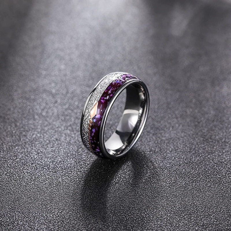 Purple seashell ring featuring abalone shell and Gibeon meteorite.