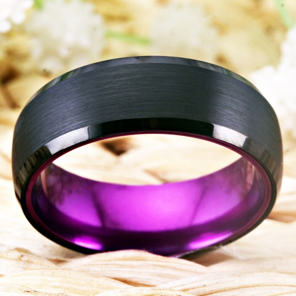 Purple wedding band crafted from Tungsten with a black exterior and purple interior.