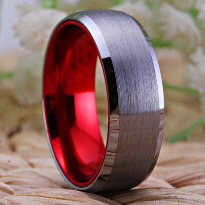 Red and silver ring with a silver Tungsten exterior, beveled edges, and red interior.