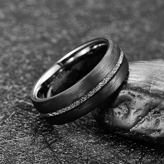 Ring carbon fiber meteorite design with Gibeon meteorite inlay in Tungsten.