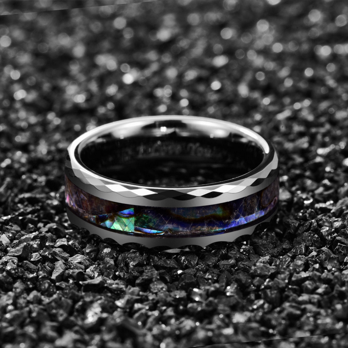 Sea themed wedding rings crafted from silver Tungsten inlaid with abalone shell.