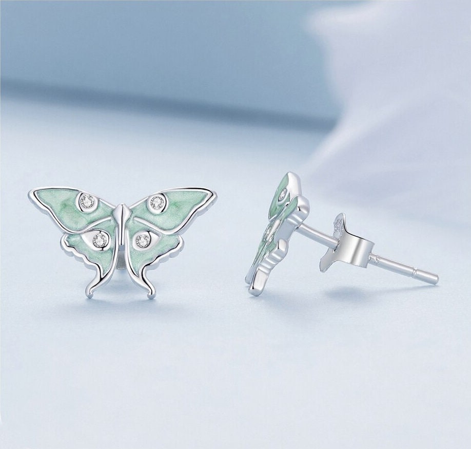 Earrings side view showing details of the design.