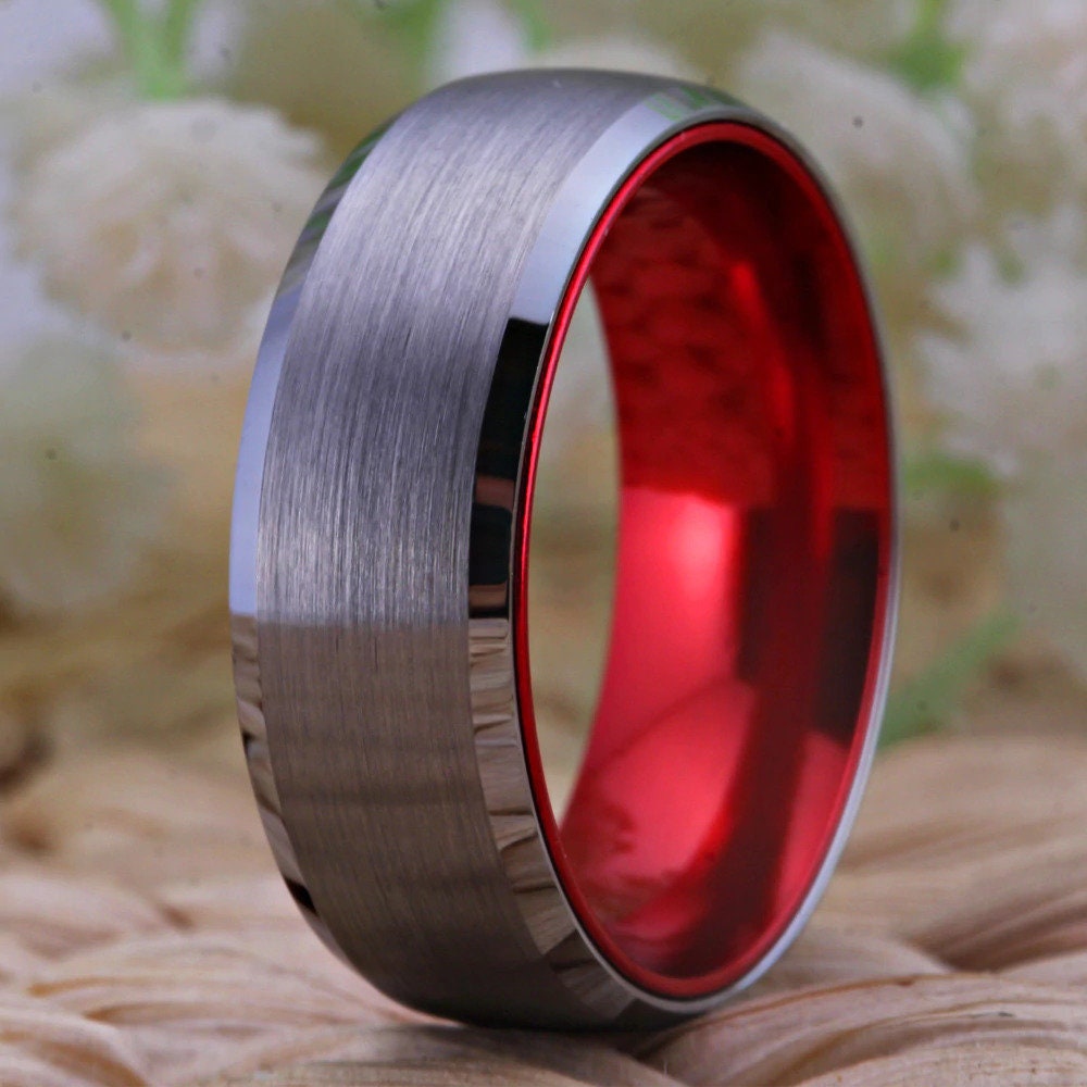 Silver and red ring crafted from Tungsten with a vibrant red interior.