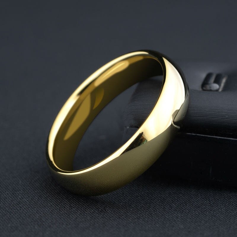 Comfort fit Tungsten gold wedding band in a polished, domed shape.