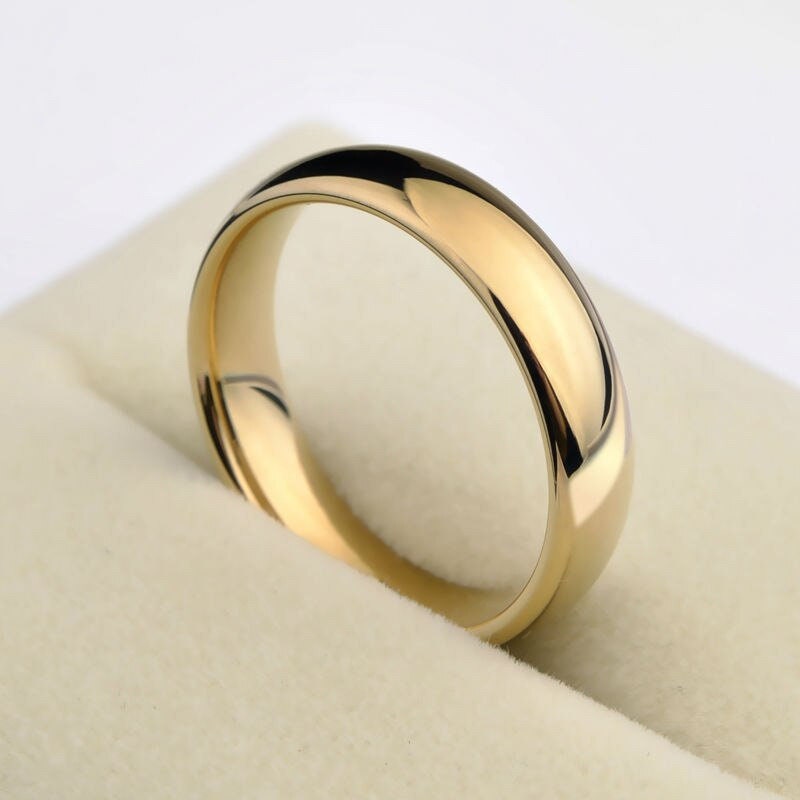 Polished finish Tungsten gold wedding bands in a comfort fit design.