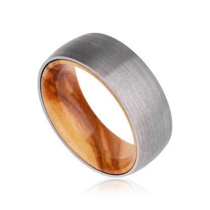 Wood rings for men made with silver Tungsten and an Olive wood interior.