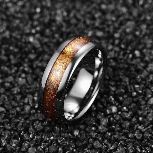 Tungsten gold inlay ring with 24k gold leaf shown on black background.