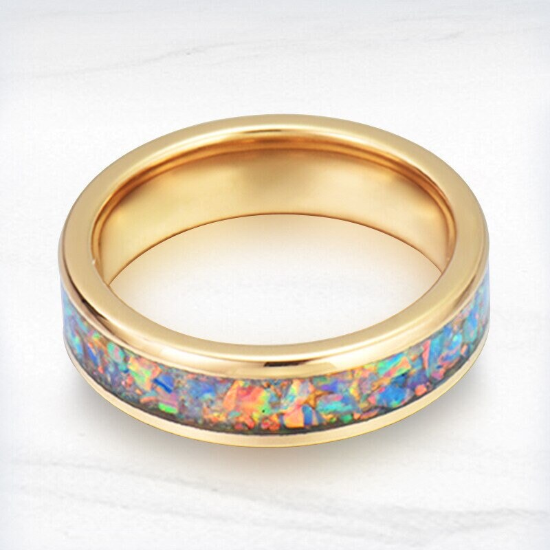 Unique affordable wedding rings with gold Tungsten and opal inlay.