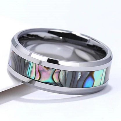 Waterproof rings crafted from Tungsten with natural rainbow abalone shell inlay.